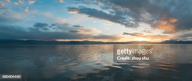 the cloud of the chaka salt lake - railway tracks sunset stock pictures, royalty-free photos & images