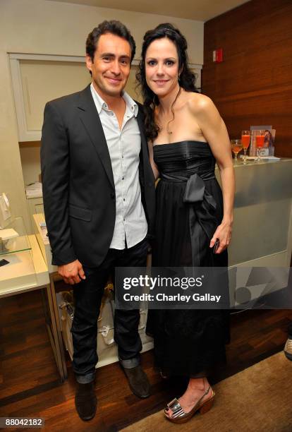 Actors Demian Bichir and Actress Mary-Louise Parker attend an Evening of Shopping to Benefit Worldwide Orphans Foundation at La Perla on May 28, 2009...