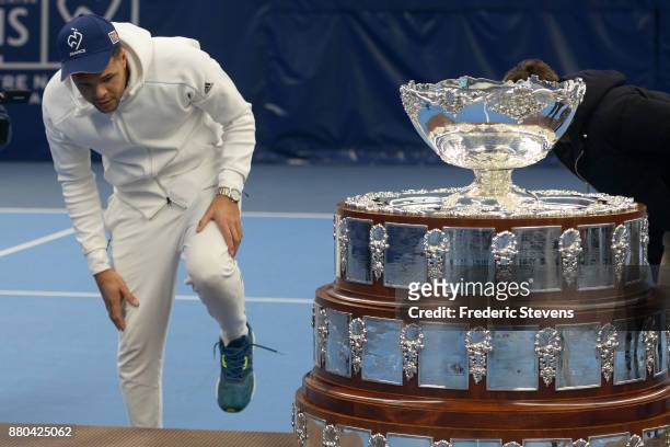 Jo Wilfried Tsonga poses with the Davis Cup after victory over Belgium at the weekend in Villeneuve d'Ascq, on November 27, 2017 in Paris, France.