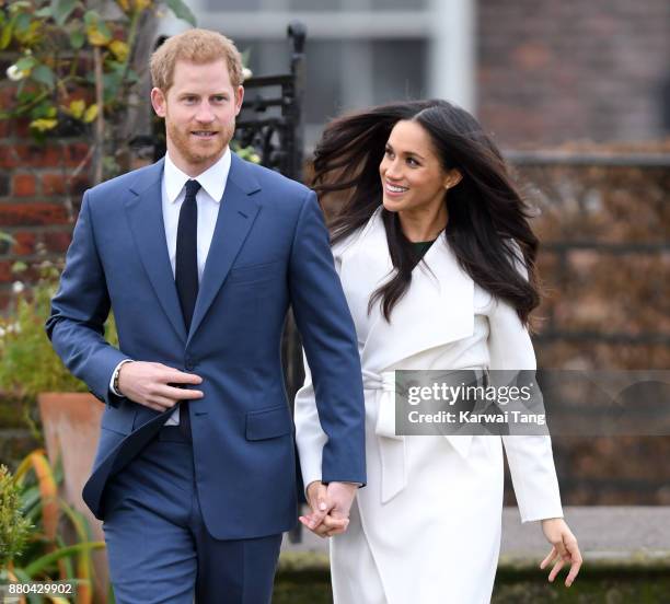 Prince Harry and Meghan Markle attend an official photocall to announce the engagement of Prince Harry and actress Meghan Markle at The Sunken...