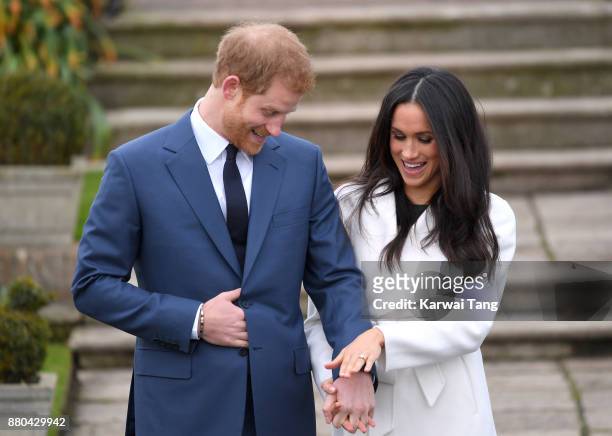 Prince Harry and Meghan Markle attend an official photocall to announce the engagement of Prince Harry and actress Meghan Markle at The Sunken...