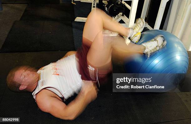 Michael Crocker of the Maroons trains in the gym during a Queensland Maroons State of Origin training session at Visy Park on May 29, 2009 in...