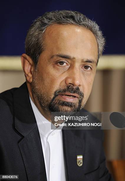 Mohammad Nahavandian, President of Iran's Chamber of Commerce, Industries and Mines speaks during a press conference at the Foreign Correspondents'...