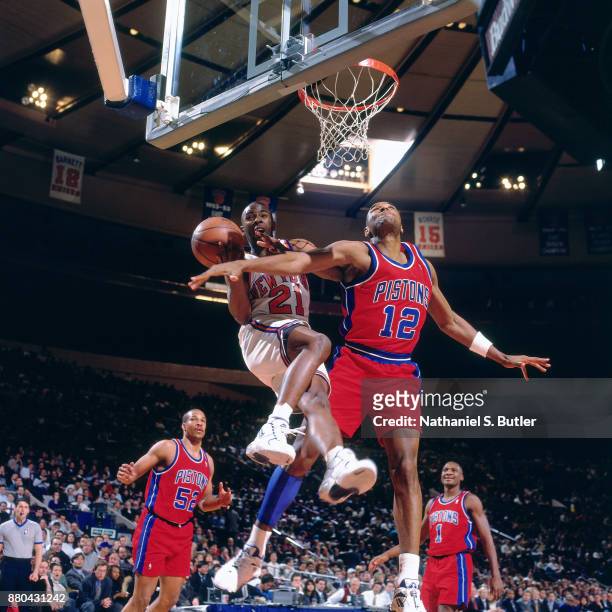 Charlie Ward of the New York Knicks shoots during a game played on February 5, 1996 at Madison Square Garden in New York City. NOTE TO USER: User...