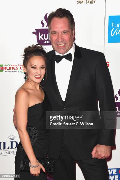 Frankie Poultney and David Seaman attend The British Curry Awards at Battersea Evolution on November 27, 2017 in London, England.