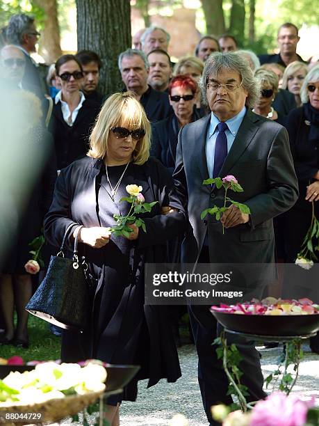 Helmut Markwort and his partner Patricia Riekel attend the funeral of German actress Barbara Rudnik at Nordfriedhof cemetery on May 29, 2009 in...