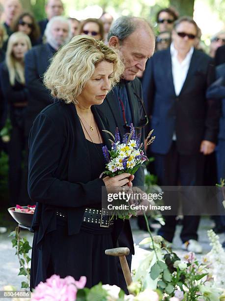 Michaela May and Michael Mendl attend the funeral of German actress Barbara Rudnik at Nordfriedhof cemetery on May 29, 2009 in Munich, Germany.