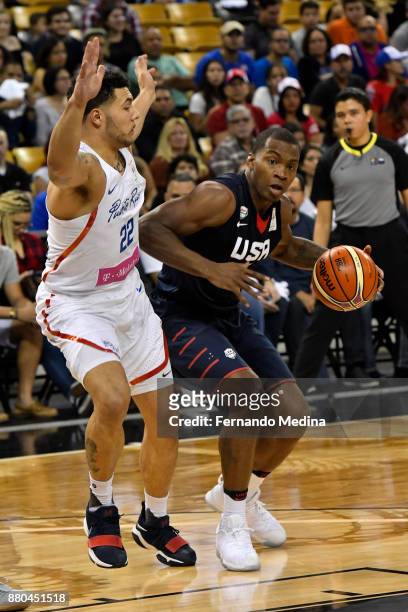 Elijah Millsap of Team USA dribbles the ball against Purto Rico during the FIBA World Cup America Qualifiers on November 23, 2017 at CFE Arena in...