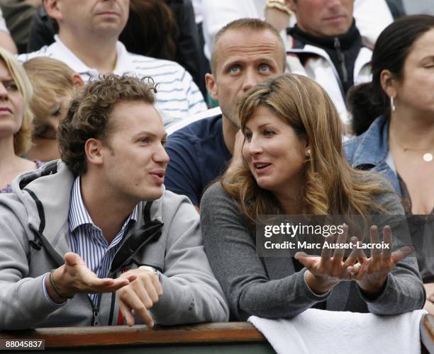 Mirka Vavrinec attends the second round match between Switzerland's Roger Federer and Argentina's Jose Acasuso at the French Open tennis tournament...