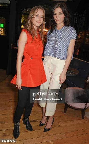 Olympia Campbell and Amber Anderson attend the Carven dinner hosted by new creative director Serge Ruffieux at Clarette on November 27, 2017 in...