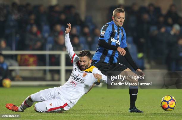 Timothy Castagne of Atalanta BC competes for the ball with Marco D Alessandro of Benevento Calcio during the Serie A match between Atalanta BC and...
