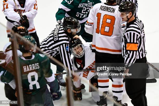 Max Becker of the Princeton Tigers gets up after a small scuffle during the second period at Hobey Baker Rink on November 24, 2017 in Princeton, New...