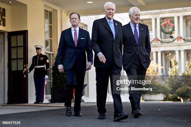 Senate Majority Whip John Cornyn, a Republican from Texas, from right, Senator Orrin Hatch, a Republican from Utah and chairman of the Senate Finance...