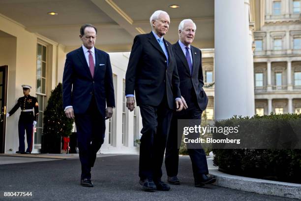 Senate Majority Whip John Cornyn, a Republican from Texas, from right, Senator Orrin Hatch, a Republican from Utah and chairman of the Senate Finance...