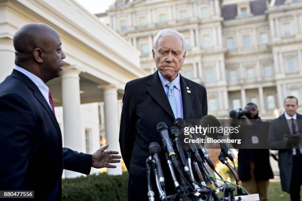 Senator Orrin Hatch, a Republican from Utah and chairman of the Senate Finance Committee, pauses while speaking to members of the media as Senator...