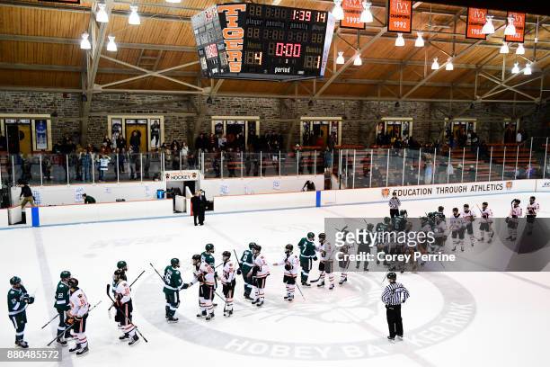 The Bemidji State Beavers shake hands with the Princeton Tigers after the game at Hobey Baker Rink on November 24, 2017 in Princeton, New Jersey....