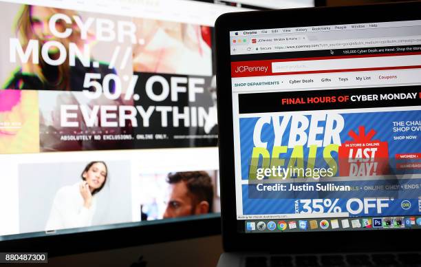 In this photo illustration, an ad seen on the JCPenney website for a Cyber Monday sale is displayed on laptop computers on November 27, 2017 in San...