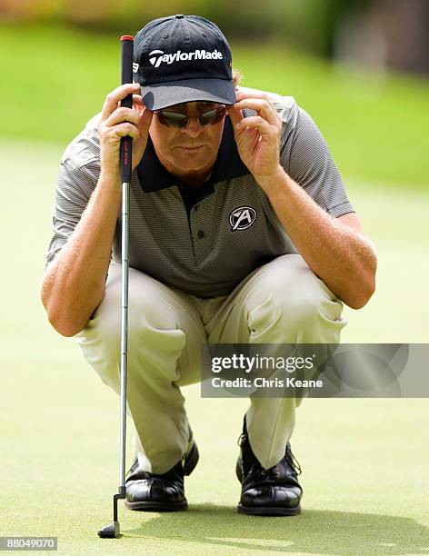 David Mathis lines up a putt on the 17th hole during the second round of the Rex Hospital Open Nationwide Tour golf tournament at the TPC Wakefield...