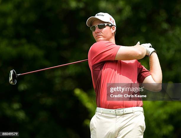 Garth Mulroy watches his drive on the 18th hole hole during the second round of the Rex Hospital Open Nationwide Tour golf tournament at the TPC...