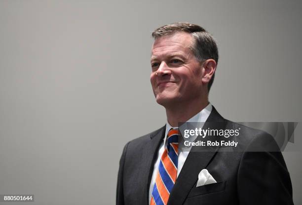 Florida Gators athletic director Scott Stricklin looks on during an introductory press conference for new football head coach Dan Mullen at the Bill...