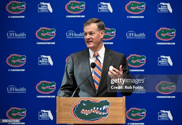 Florida Gators athletic director Scott Stricklin speaks during an introductory press conference for new football head coach Dan Mullen at the Bill...