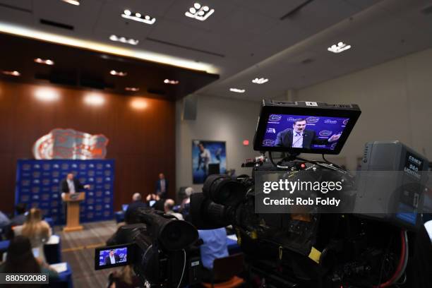 Detailed view of a live television feed recording as Dan Mullen speaks during an introductory press conference at the Bill Heavener football complex...