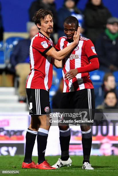 Lasse Vibe of Brentford celebrates scoring the 2nd Brentford goal with Kamo Mokotjo of Brentford during the Sky Bet Championship match between Queens...