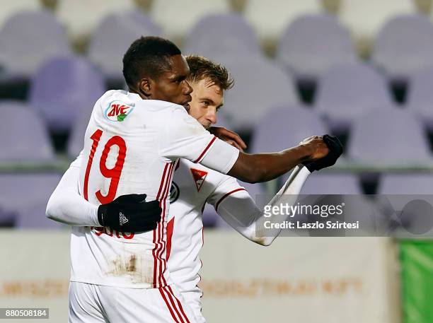 Justin Mengolo of DVSC celebrates his goal and dances the tango with Balazs Benyei of DVSC during the Hungarian OTP Bank Liga match between Vasas FC...