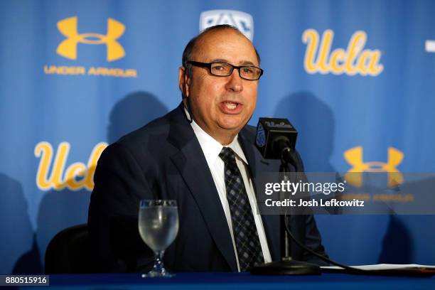 Director of Athletics Dan Guerrero speaks to the media introducing Chip Kelly as the new UCLA Football head coach during a press conference on...