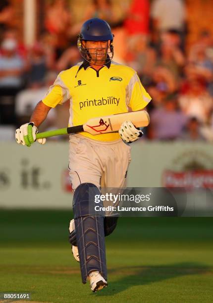 Stuart Law of Derbyshire hits out using the new mongoose bat with a long handle and shortened bat face during the Twenty20 Cup match between...