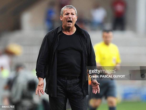 Montpellier's coach Rolland Courbis reacts during the French L2 football match against Strasbourg on May 29, 2009 in Montpellier. AFP PHOTO / PASCAL...
