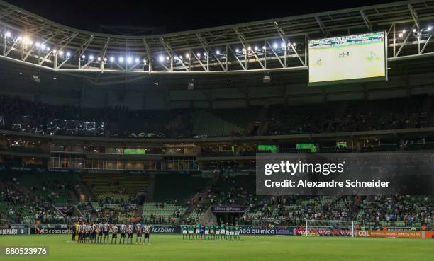 Players of Palmeiras and of Botafogo pray before the match for the Brasileirao Series A 2017 at Allianz Parque Stadium on November 27, 2017 in Sao...