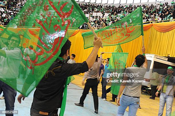 Supporters of presidential candidate Mir-Hossein Mousavi, the ex and last Prime Minister of Iran, participate in a rally attended by former president...