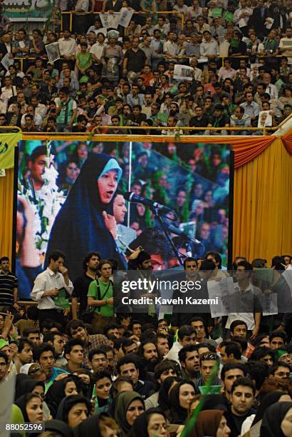 Supporters of presidential candidate Mir-Hossein Mousavi, the ex and last Prime Minister of Iran, participate in a rally attended by former president...