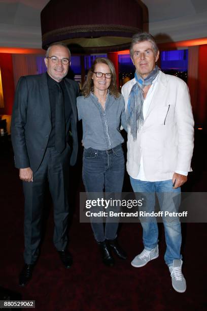 Laurent Weil, his wife Fiona and CEO of Hotel Barriere Dominique Desseigne attend the Inauguration of the "Chalet Les Neiges 1850" on the terrace of...