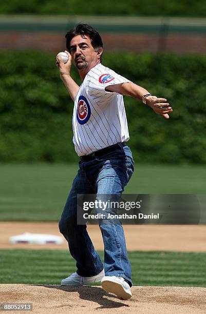 Actor Joe Mantegna throws a ceremonial first pitch before a game bewteen the Chicago Cubs and the Los Angeles Dodgers on May 29, 2009 at Wrigley...