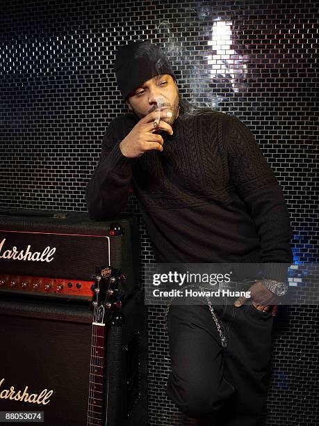 Rapper Jim Jones poses for a portrait session for Black Men Magazine in New York City.