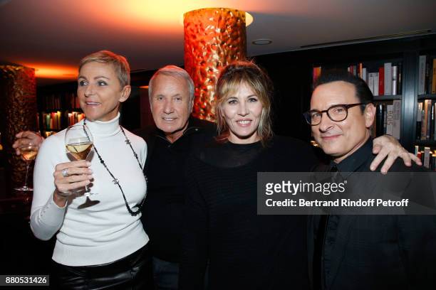 Yves Renier with his wife Karin, Mathilde Seigner and Jean-Marc Genereux attend the Inauguration of the "Chalet Les Neiges 1850" on the terrace of...