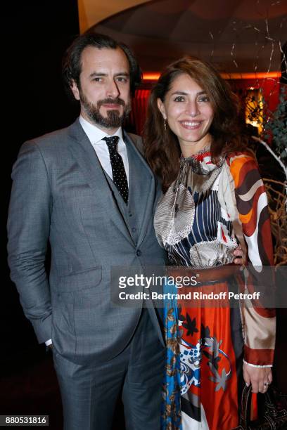 Caterina Murino and her companion Edouard Grigaud attend the Inauguration of the "Chalet Les Neiges 1850" on the terrace of the Hotel "Barriere Le...