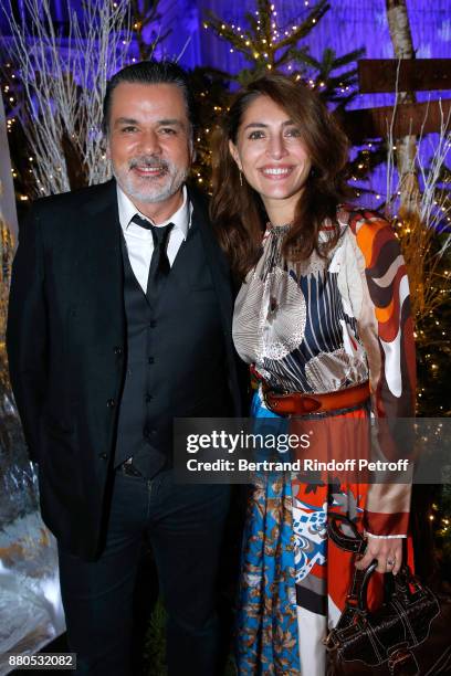 Christophe Barratier and Caterina Murino attend the Inauguration of the "Chalet Les Neiges 1850" on the terrace of the Hotel "Barriere Le Fouquet's...