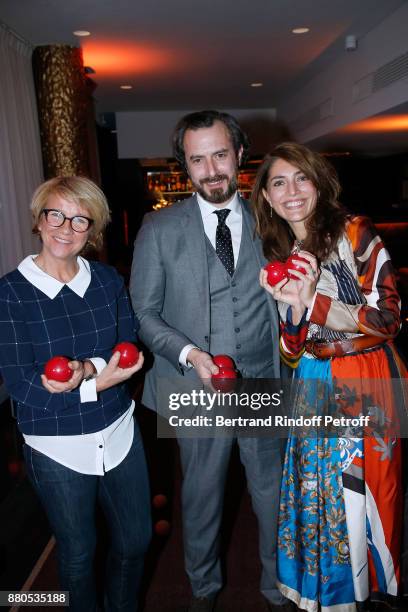 Caterina Murino , her companion Edouard Grigaud and Ariane Massenet attend the Inauguration of the "Chalet Les Neiges 1850" on the terrace of the...