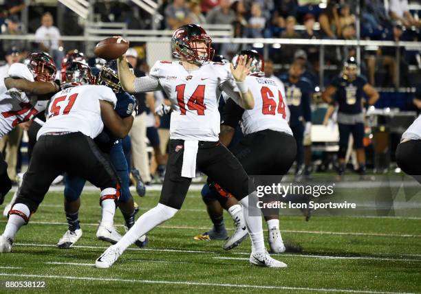 Western Kentucky quarterback Mike White passes during an NCAA football game between the Western Kentucky University Hilltoppers and the Florida...