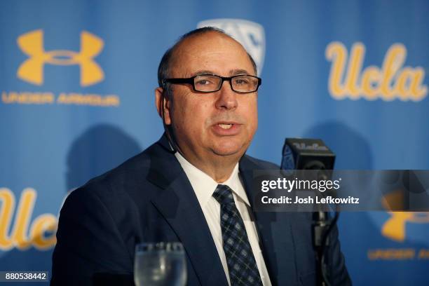 Director of Athletics Dan Guerrero speaks to the media after introducing Chip Kelly as the new head Football coach during a press conference on...