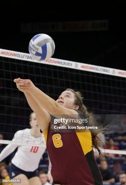 Arizona State Sun Devils setter Nicole Peterson hits the ball during the a college volleyball game between Arizona State Sun Devils and Arizona...