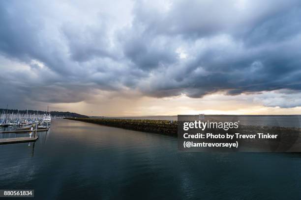 storm in the distance - seattle rain stock pictures, royalty-free photos & images