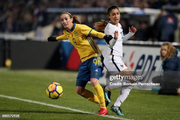 Kosovare Asllani of Sweden and Sakina Karchaoui of France in action during a Women's International Friendly match between France and Sweden at Stade...