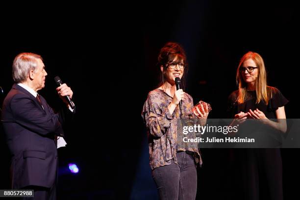 French Humorist Nora Hamzawi is being awarded with the Sacem's Great Prize of Humor by Italian Singer Salvatore Adamo and Isabelle Carre during les...