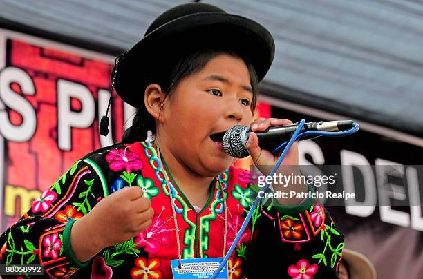 An Aymara children claims during the inauguration ritual of the 4th Abya Yala Continental Summit of Indigenous People on May 29, 2009 in Puno, Peru....