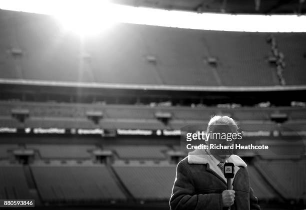 Commentator John Motson looks on before the Premier League match between Tottenham Hotspur and West Bromwich Albion at Wembley Stadium on November...