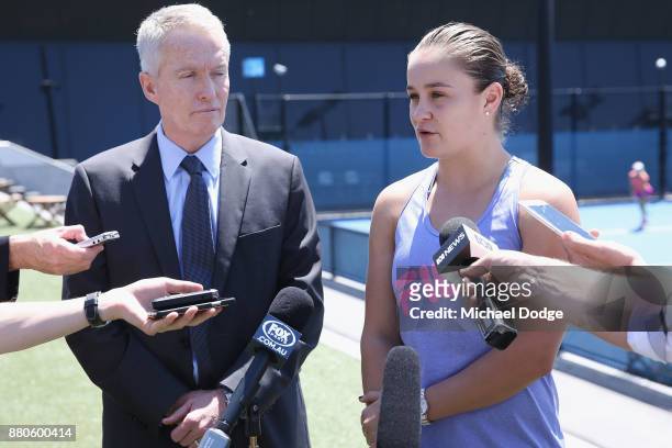 Newcombe Medallist Ashleigh Barty speaks to media next to Tennis Australia CEO Craig Tiley at Melbourne Park on November 28, 2017 in Melbourne,...